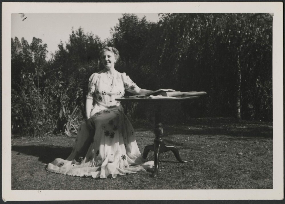 Louise Dyer in a garden