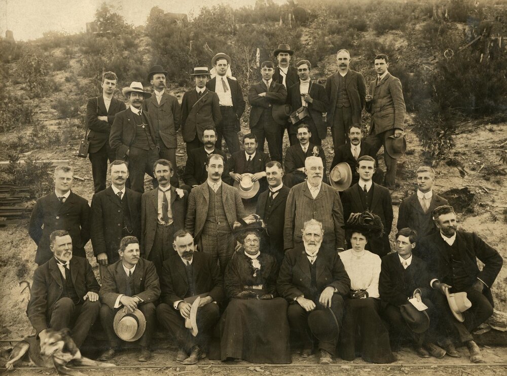 Group photograph of 30 people in a bushland setting, 1887.