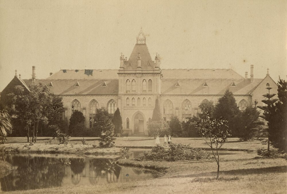 The National Museum with lake in foreground, University of Melbourne, circa 1862-1899.