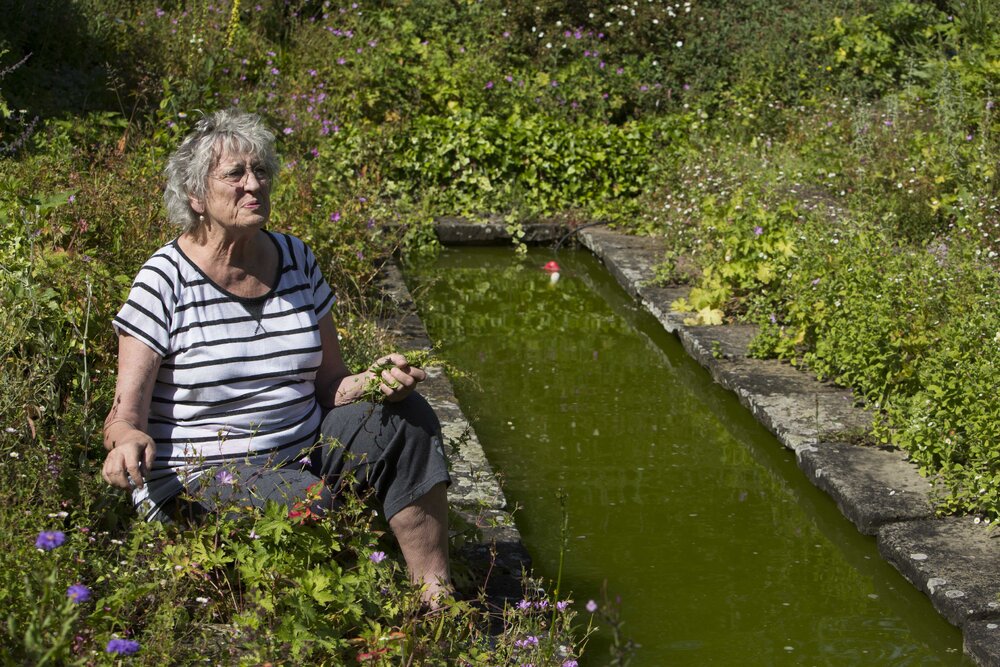 [Greer with garden and water feature]
