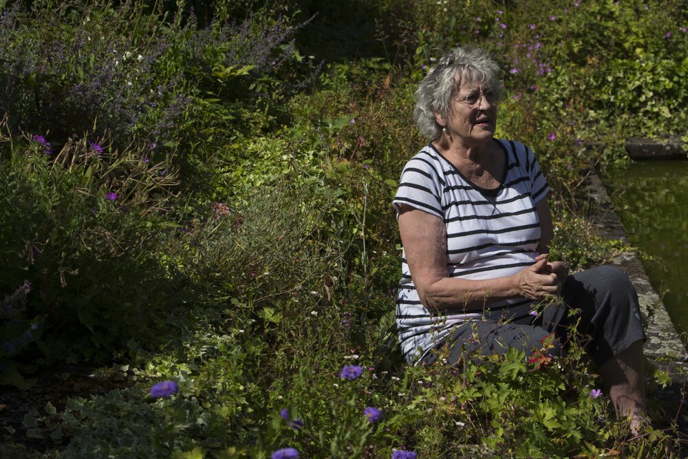 [Greer with garden and water feature]