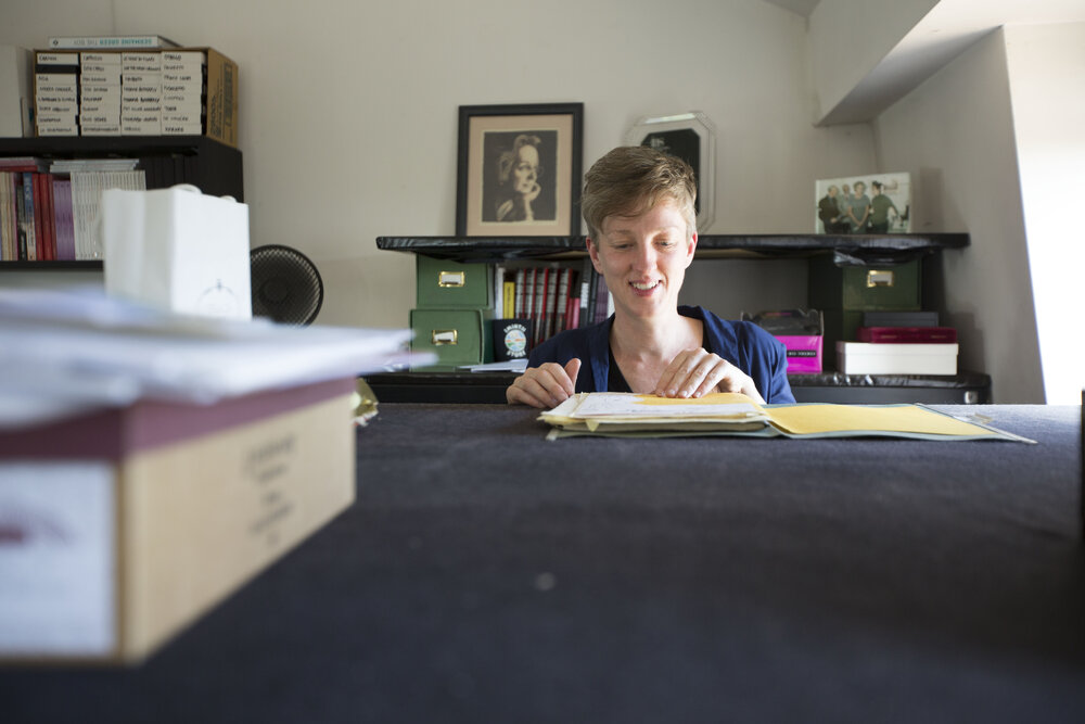 [Katrina Dean with file, Office]