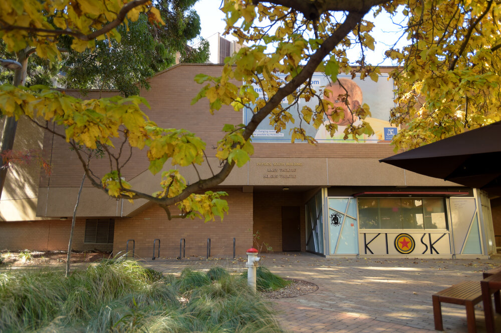 Parkville during COVID lockdown - Physcics South, David Caro Building west faade featuring the temporarily closed Castros Kiosk