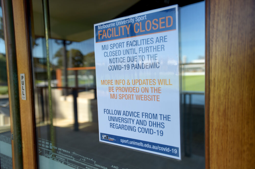 Parkville during COVID lockdown - MU Sports Ernie Cropley Sports Pavillion facility closure sign during stage 3 and 4 restrictions