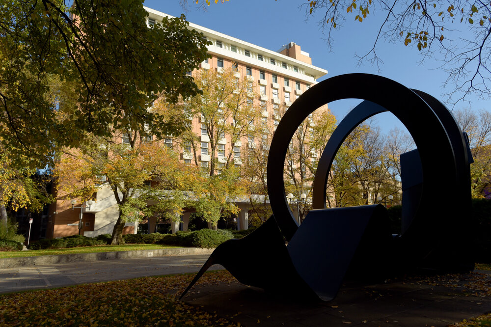 Parkville during COVID lockdown - Inge King Sun Ribbon Sculpture located on University Plaza with Raymond Priestley Building in background