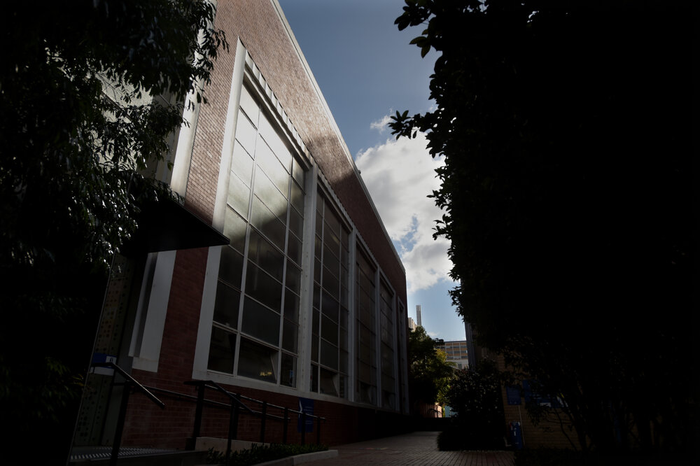 Parkville during COVID lockdown - Medtech Linkway entrance and east faade of Engineering Workshops - pathway looking north