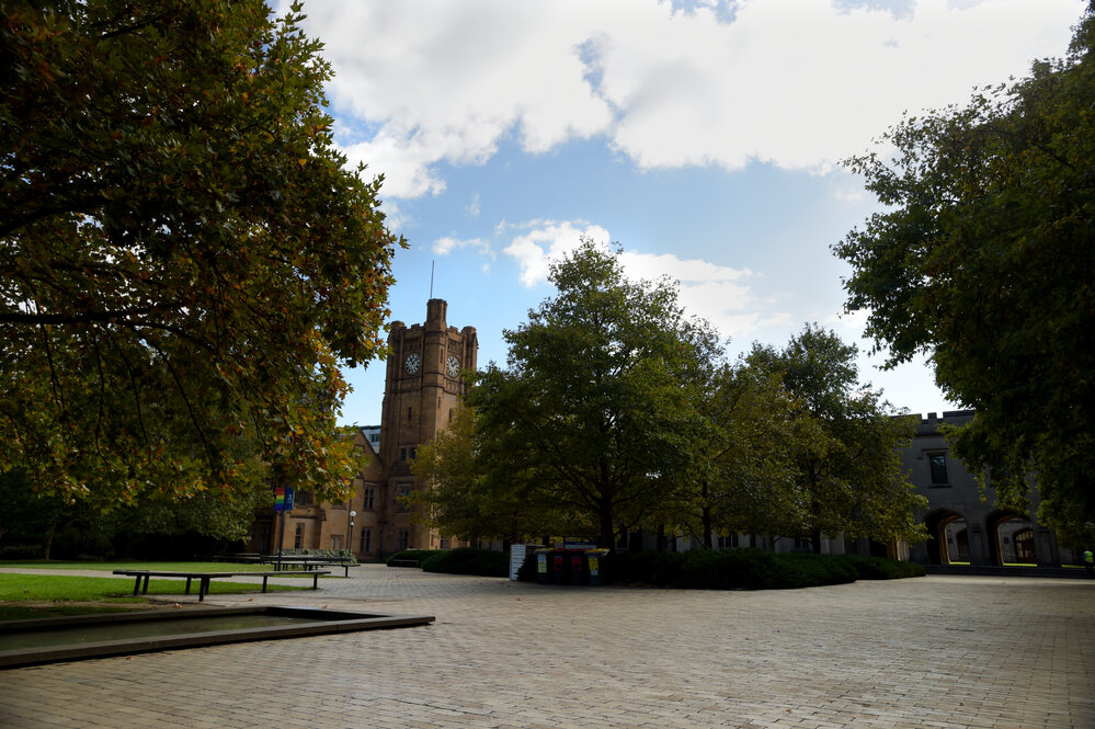 Parkville during COVID lockdown - Clocktower on Southlawn and Old Quadrangle Building