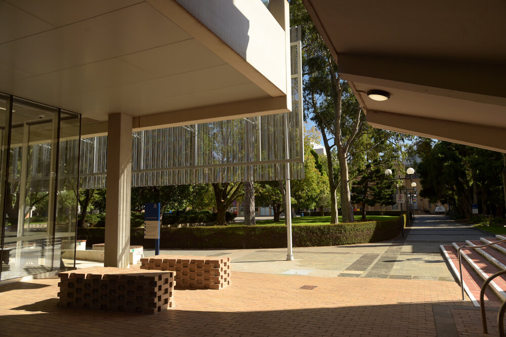 Parkville during COVID lockdown - Walkway looking west between Glyn Davis Building and Redmond Barry Building