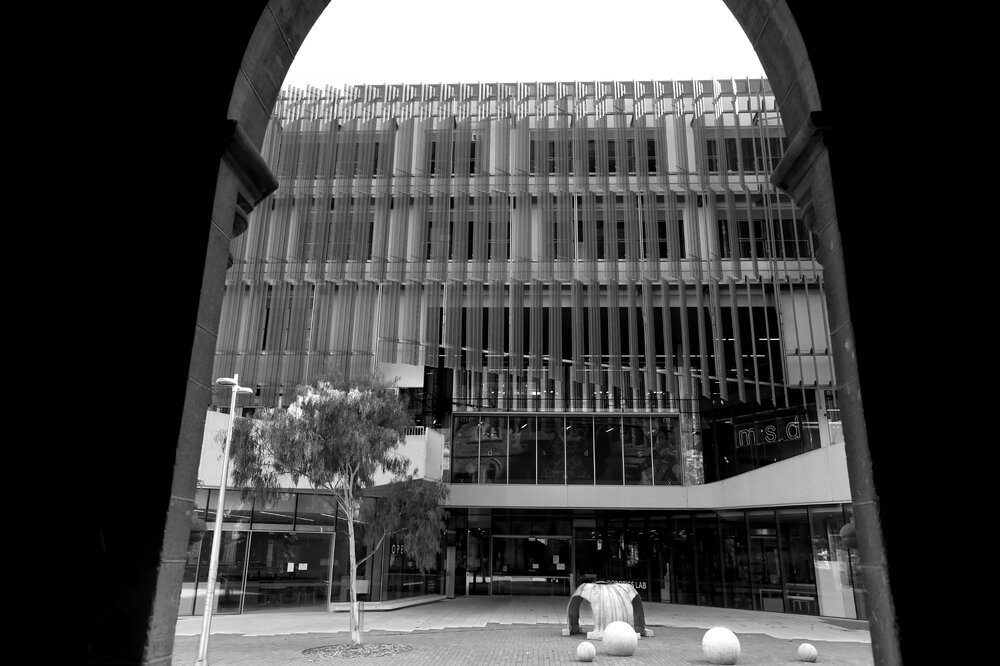 Parkville during COVID lockdown - Image taken from Elizabeth Murdoch Building, looking towards east faade of Glyn Davis Building - Monochrome