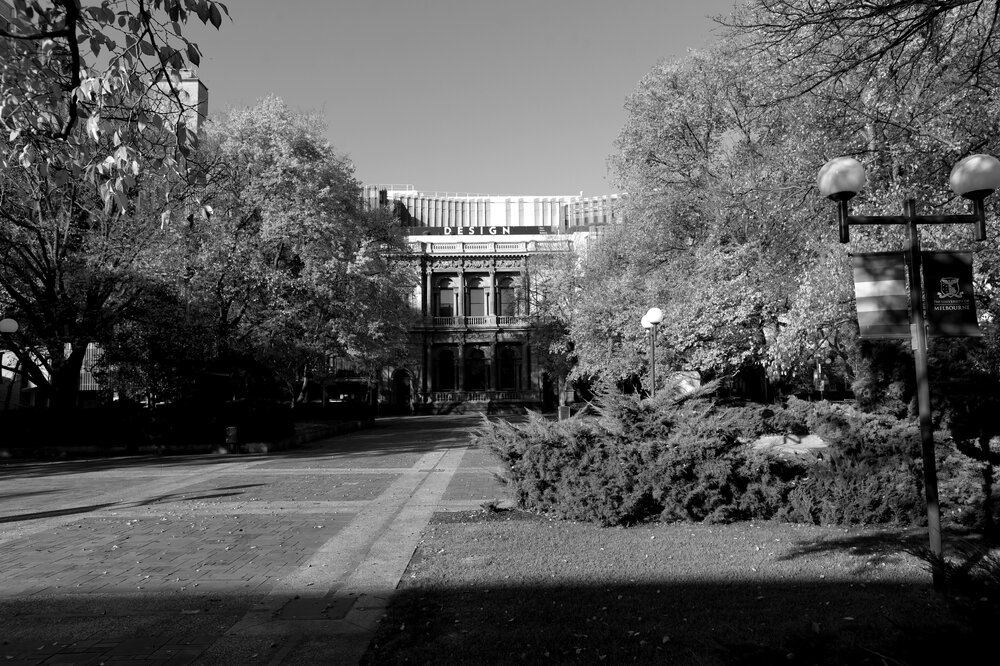 Parkville during COVID lockdown - West faade of Glyn Davis Building - photo taken from Union Road looking across University Plaza - Monochrome