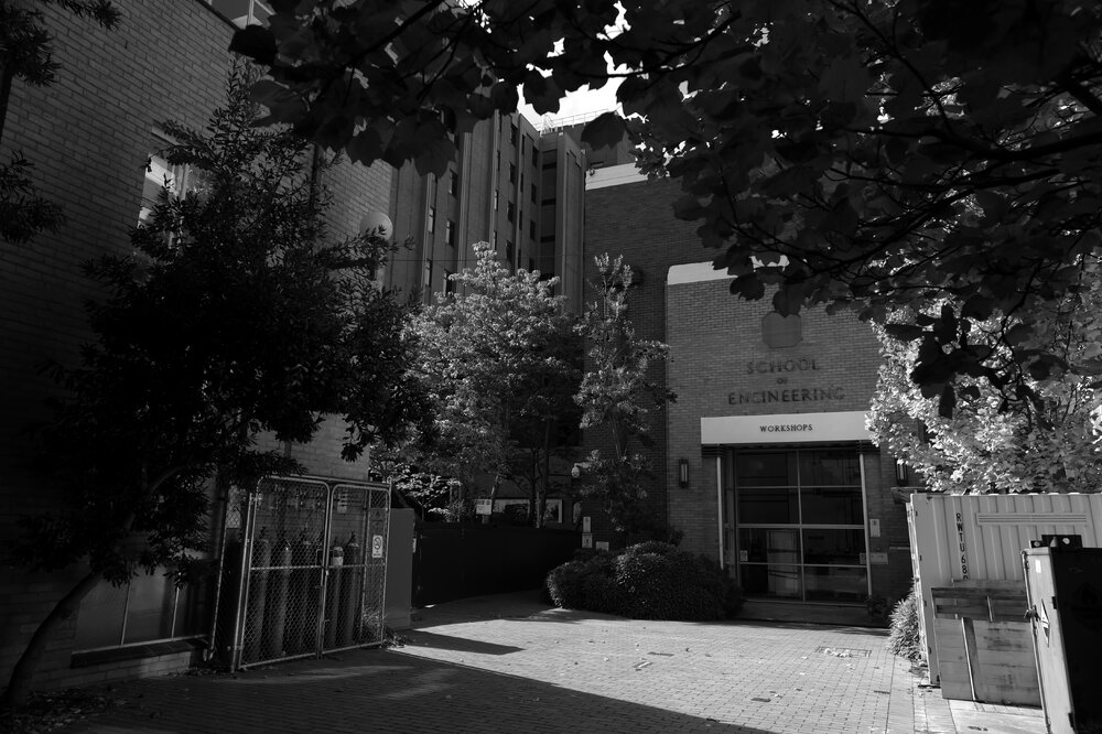 Parkville during COVID lockdown - Engineering Workshops west entrance from Engineering Lane - Monochrome