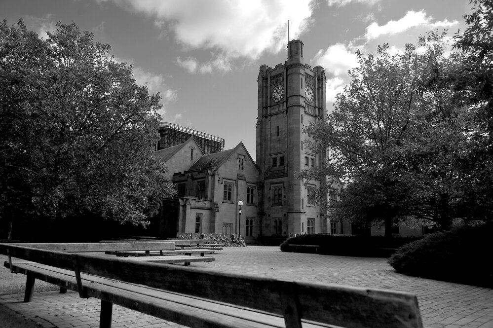 Parkville during COVID lockdown - Clocktower on Southlawn with empty seating - Monochrome