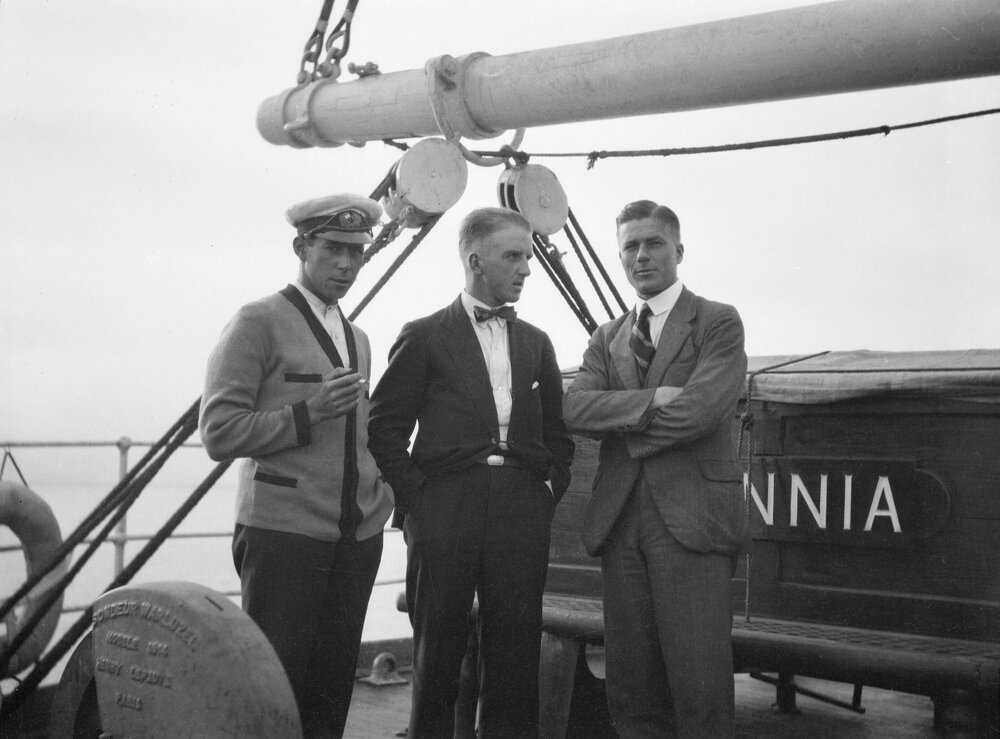 Three men on a sailing vessel in Hobsons Bay, Victoria