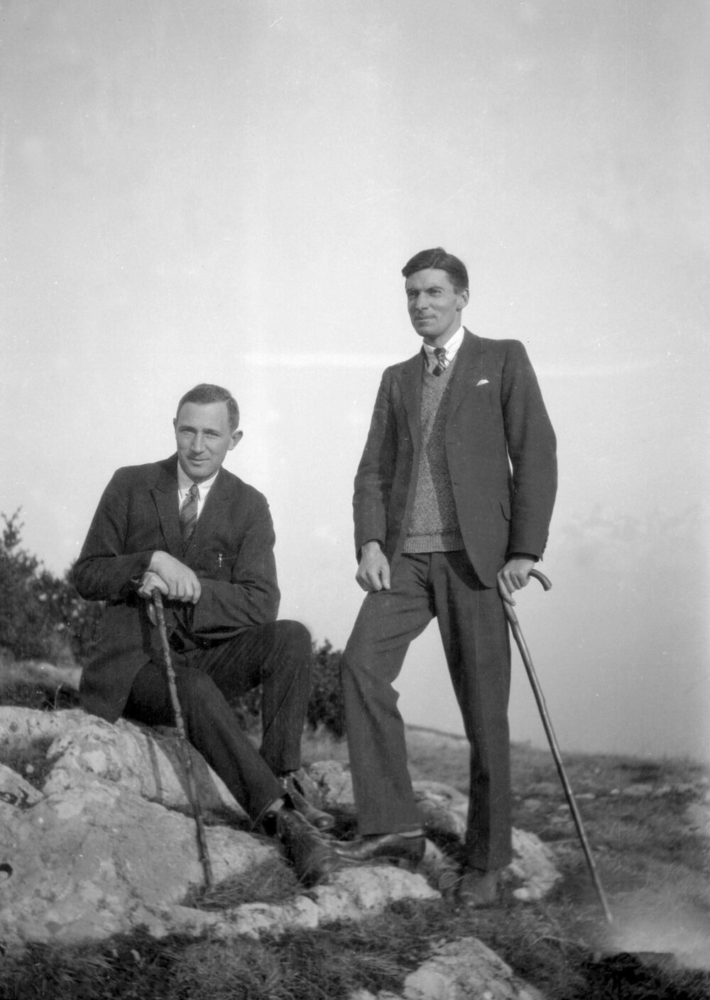 Two unidentified men and mountain scenery near Grenoble, France