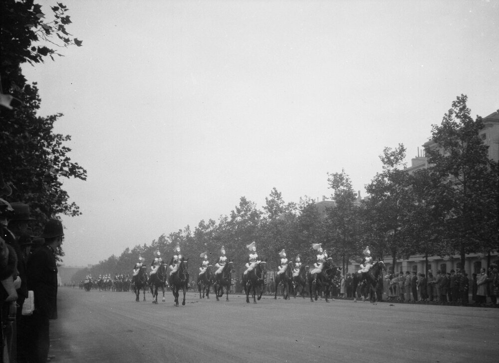 A parade of soldiers on horseback in London, England