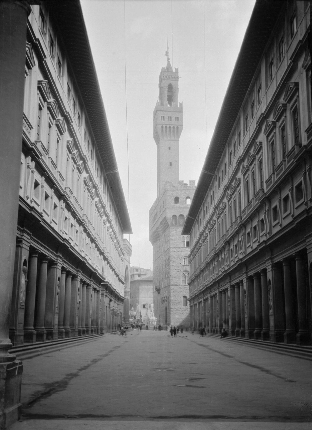Looking along a street in Florence, Italy to the Palazzo Vecchio and part of the Piazza della Signoria