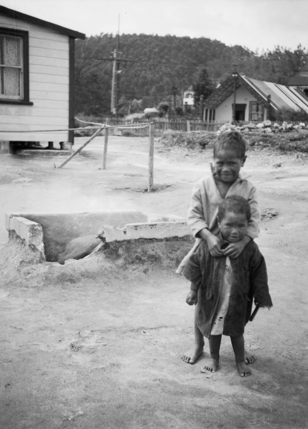 Two unidentified small children at an unknown settlement in New Zealand