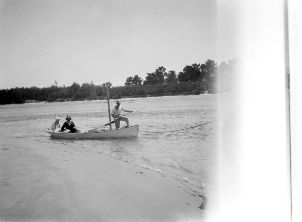 Sandbank in Anderson's Inlet Tarwin R , Inverloch [South Gippsland, Victoria] Jan 1931 Phil L, Canon L. &amp; Grace L. in boat, Charlie L. pulling, blotted out