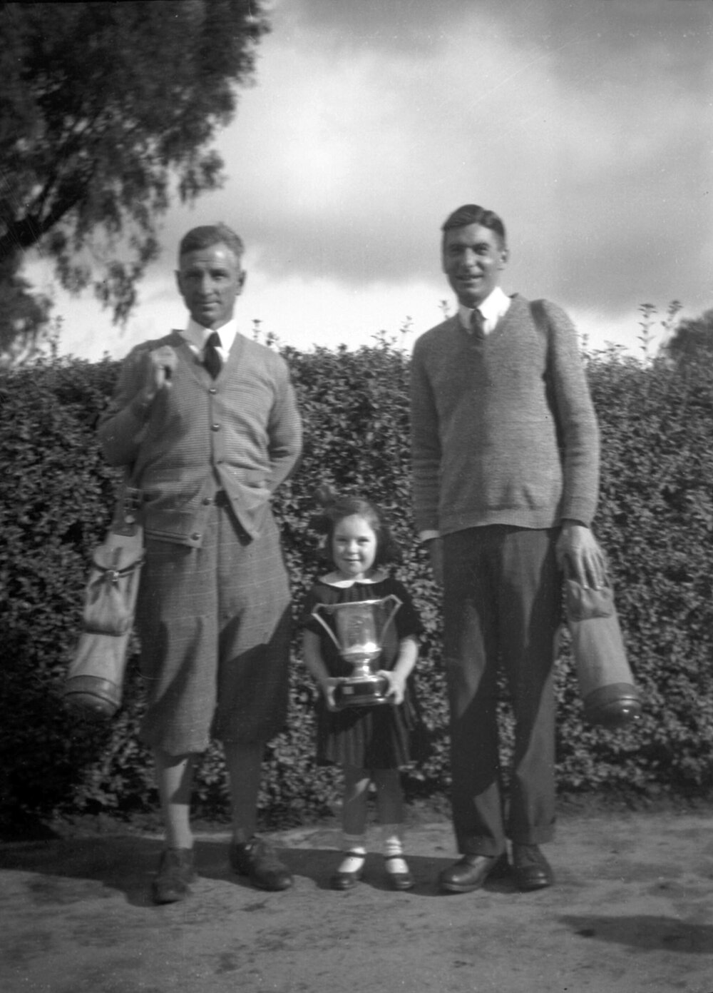 Gordon R [probably Roberts] Heather Bell (with Rochester Golf Club Cup) &amp; C.E.H. Rochester [Northern Victoria] May 1931