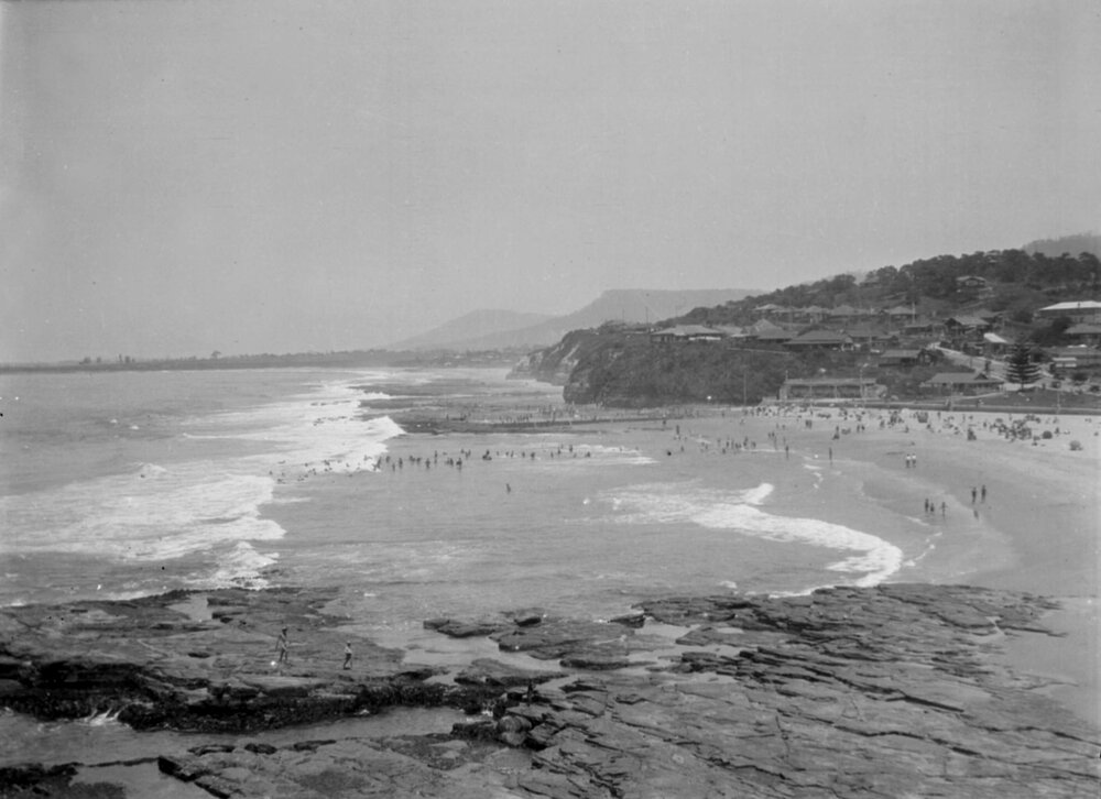 A view of the beach and coastline at Austinmer, New South Wales, looking south to Bulli