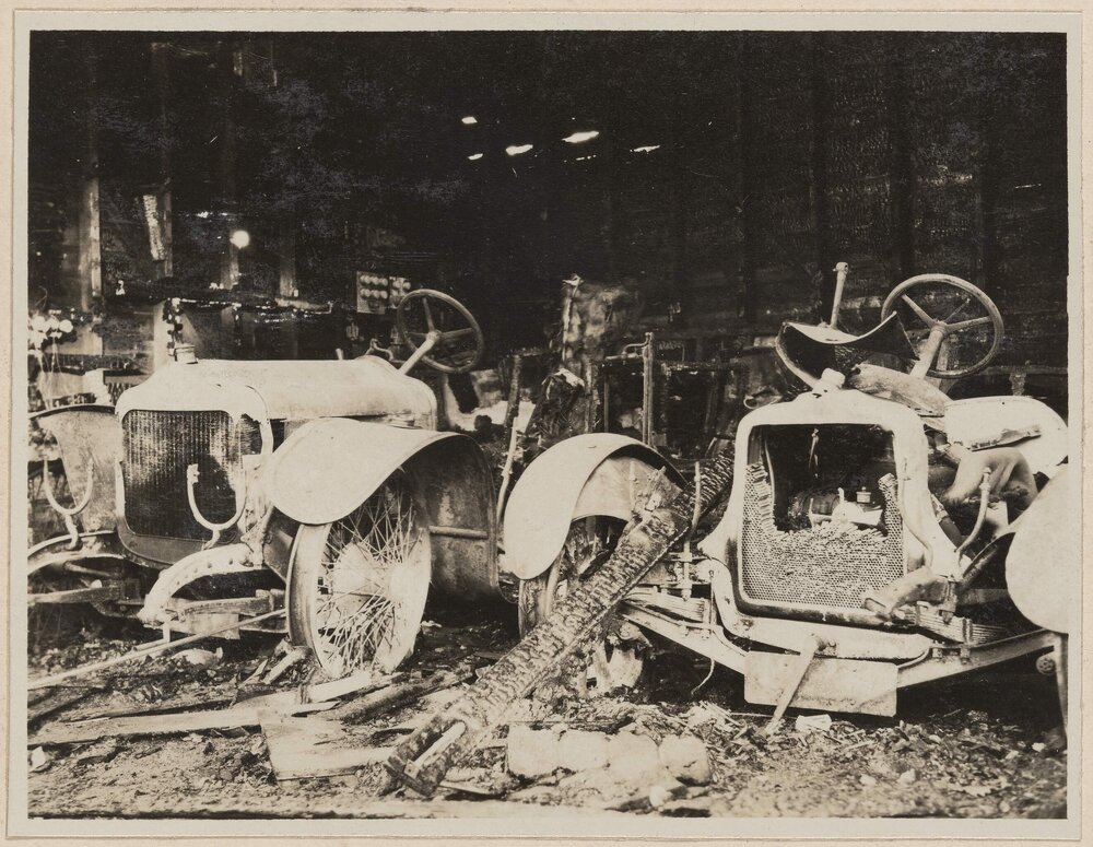 Minerva and Talbot after the fire [Miegunyah garage]