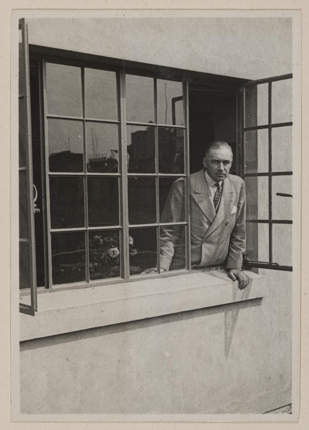 [Russell Grimwade at window] Flinders Lane [office, Melbourne]