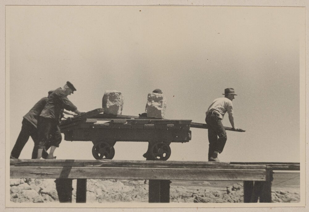 Granite blocks being loaded at Cape Everard, Victoria