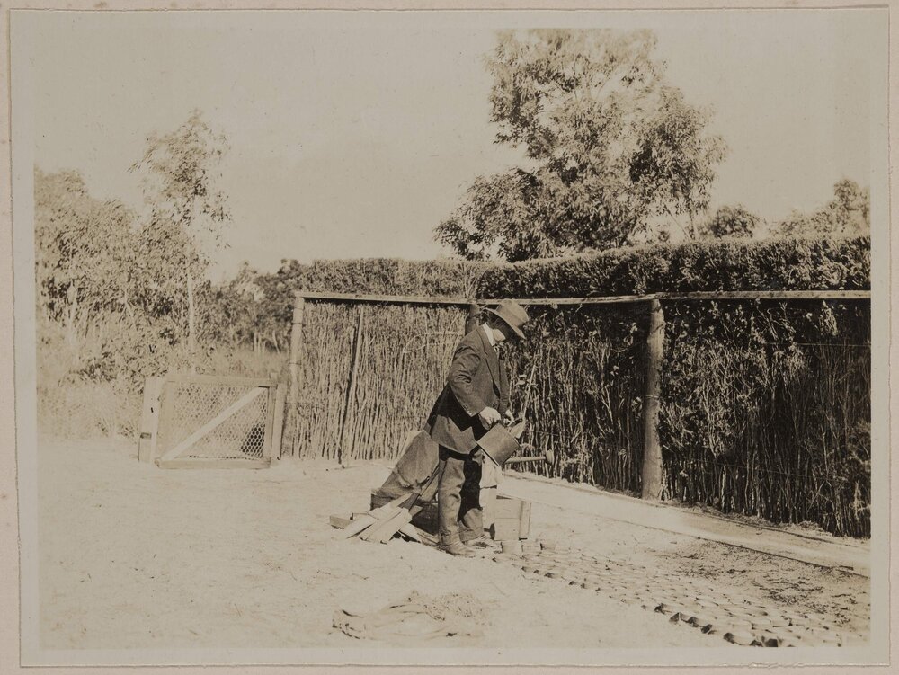 [Watering garden pots,] Frankston Golf Links