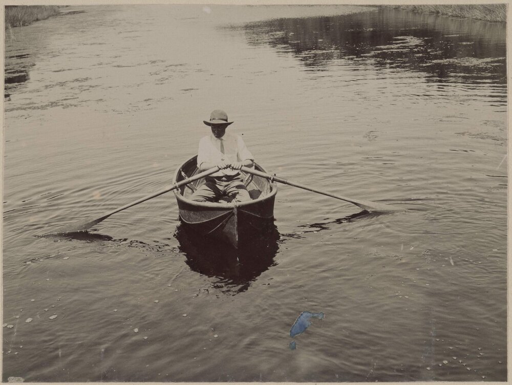 Boy in row boat, Coolart Creek