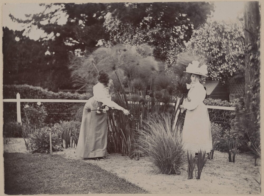 [Two women in garden,] Harleston