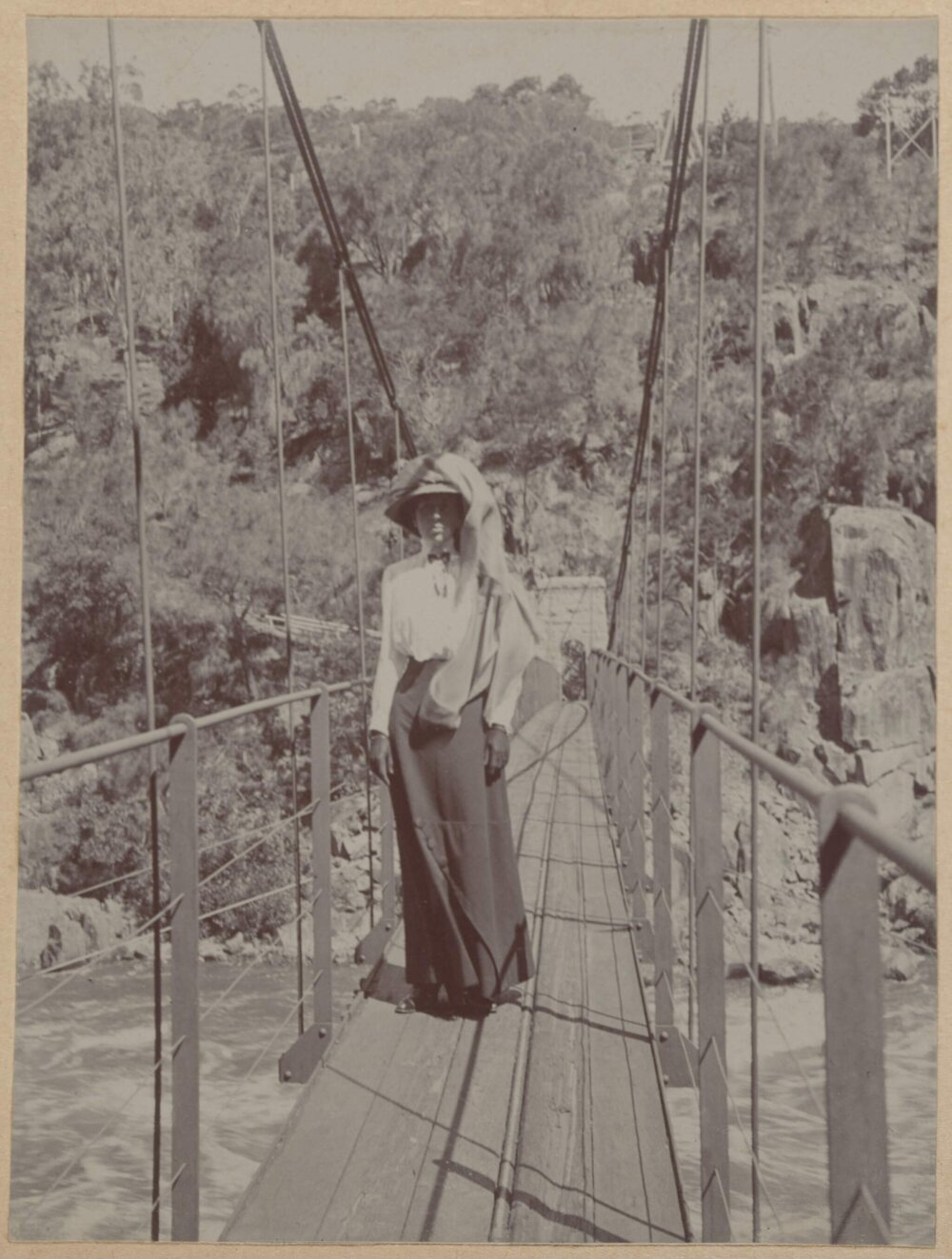[Woman standing on suspension bridge, Launceston]