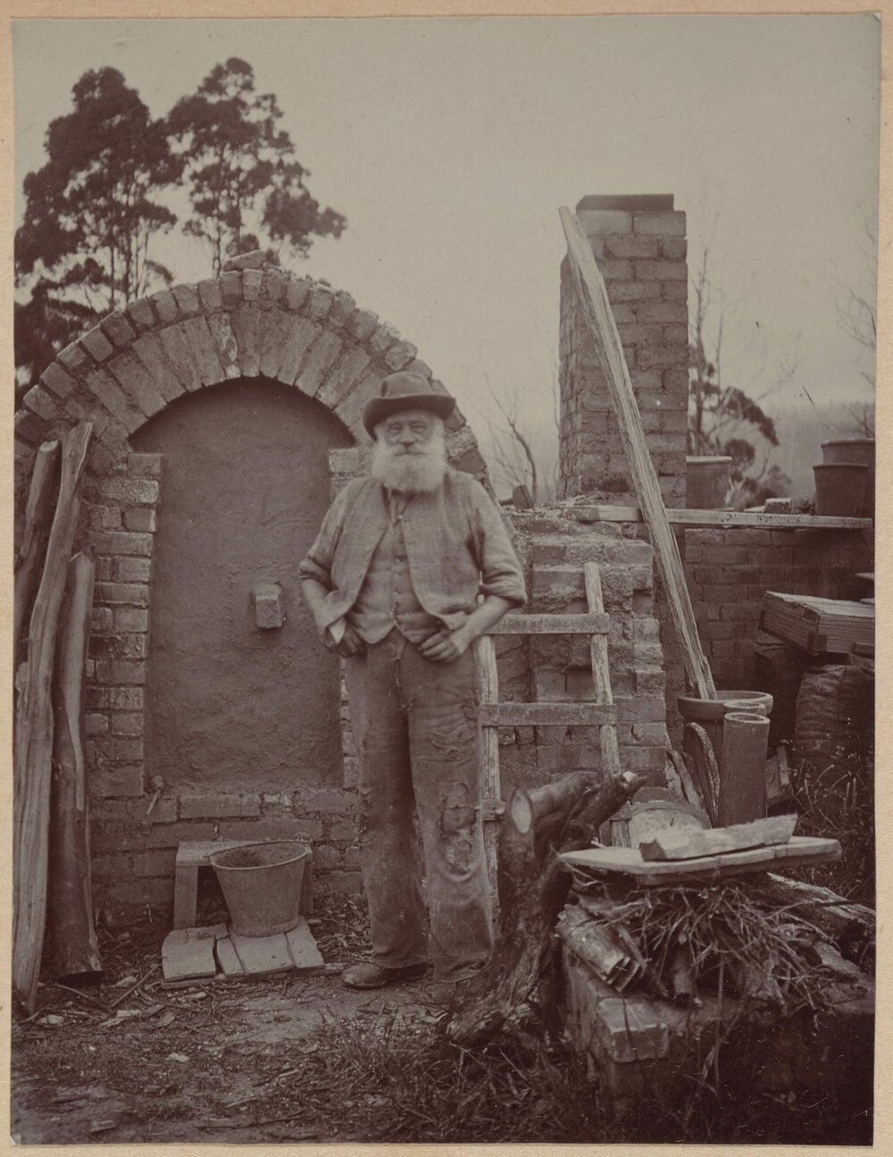 [Man with beard and hat]