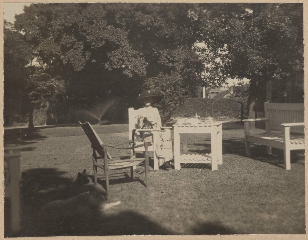 [Outdoor setting in garden]