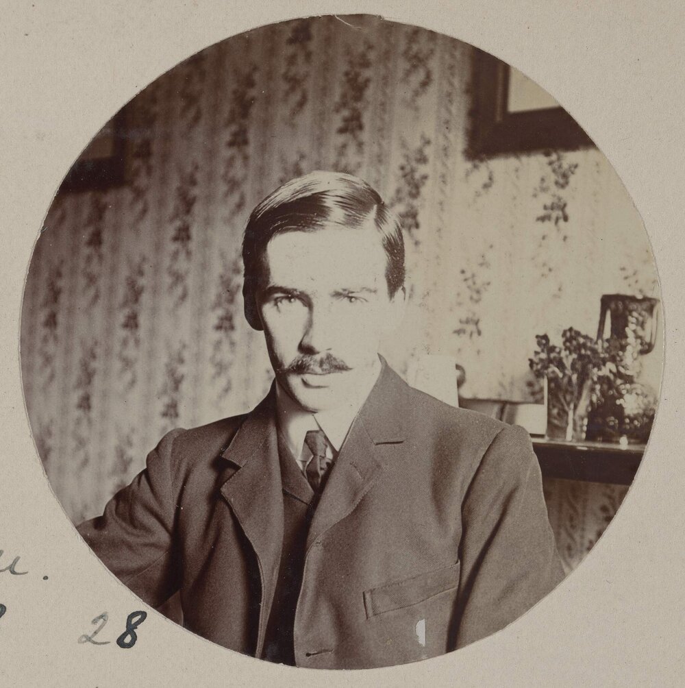 [Seated portrait of man with moustache]