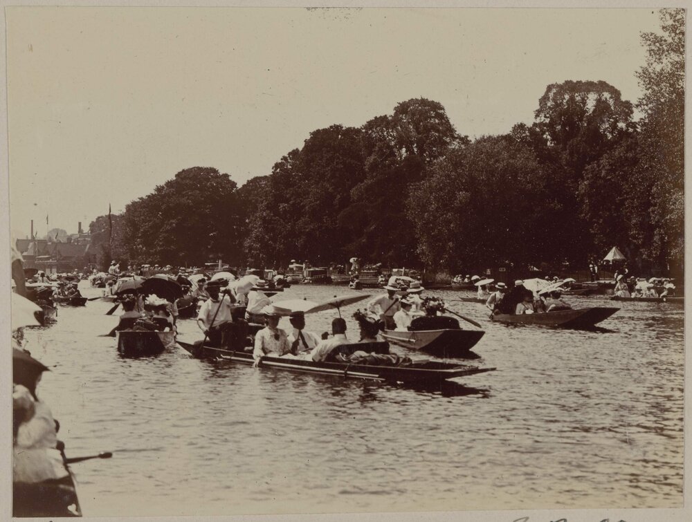 [Rowing boats on river]