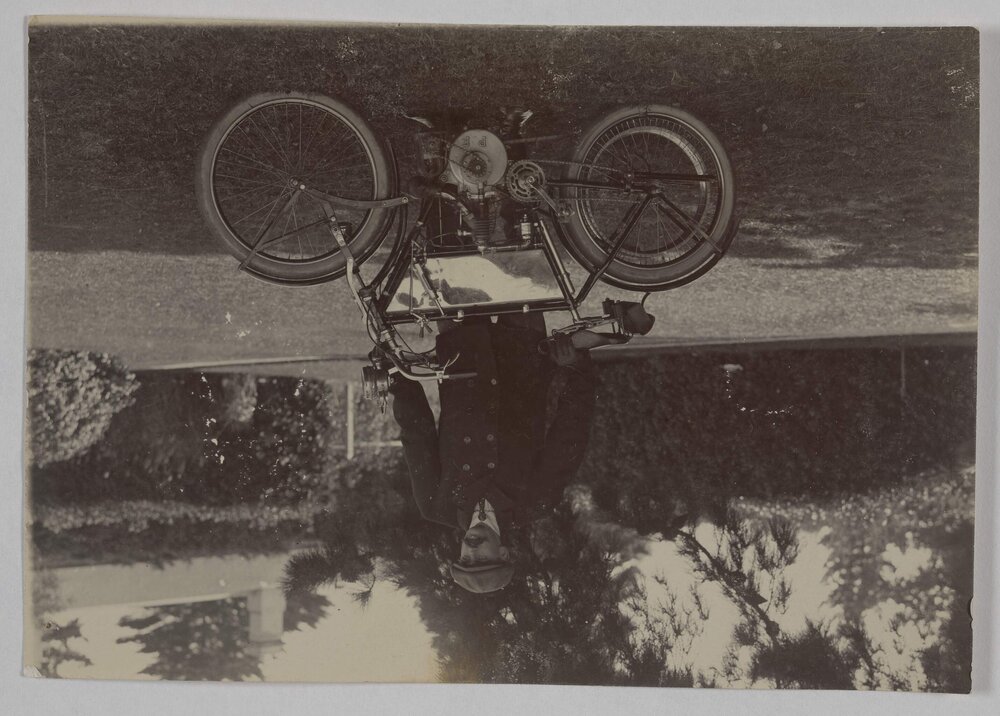 [Wilfrid Russell Grimwade with motorcycle]