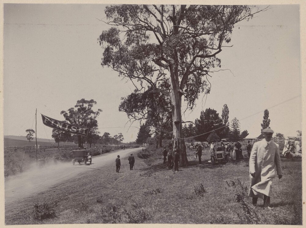 [Finish line of motor vehicle race]