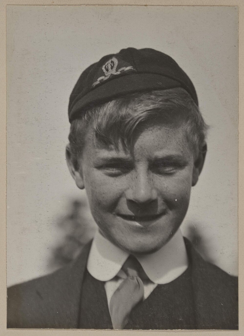 At Marathon [portrait of boy in school uniform]