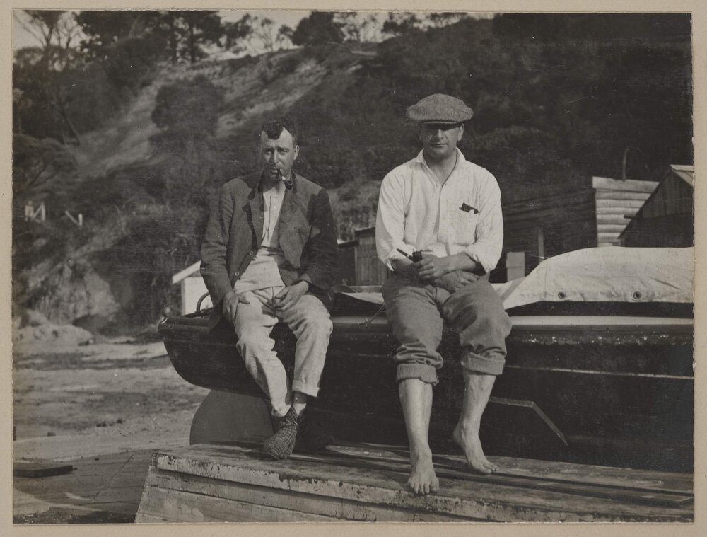 Marathon [two men sitting on boat]