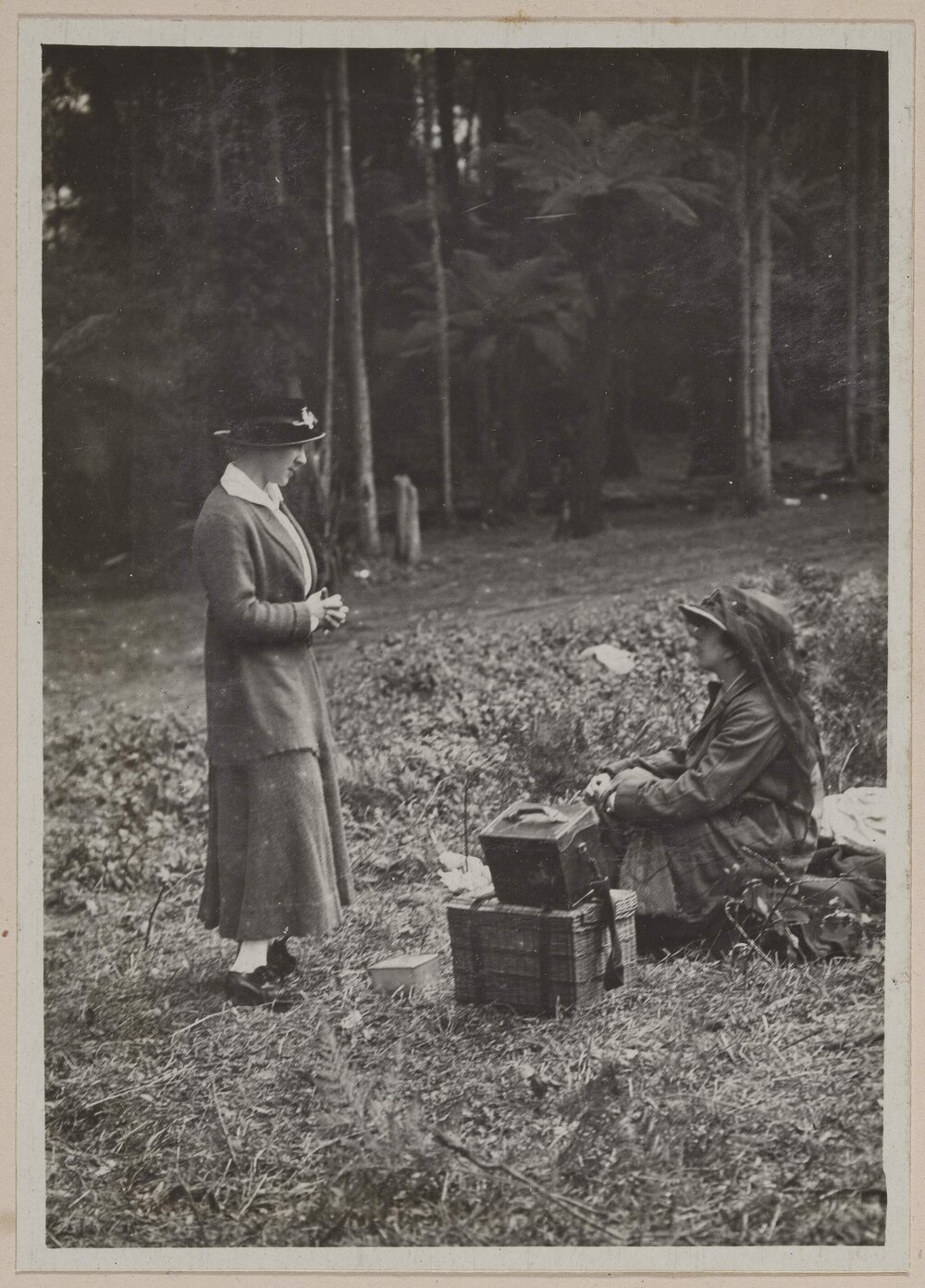 [Two women with picnic basket]