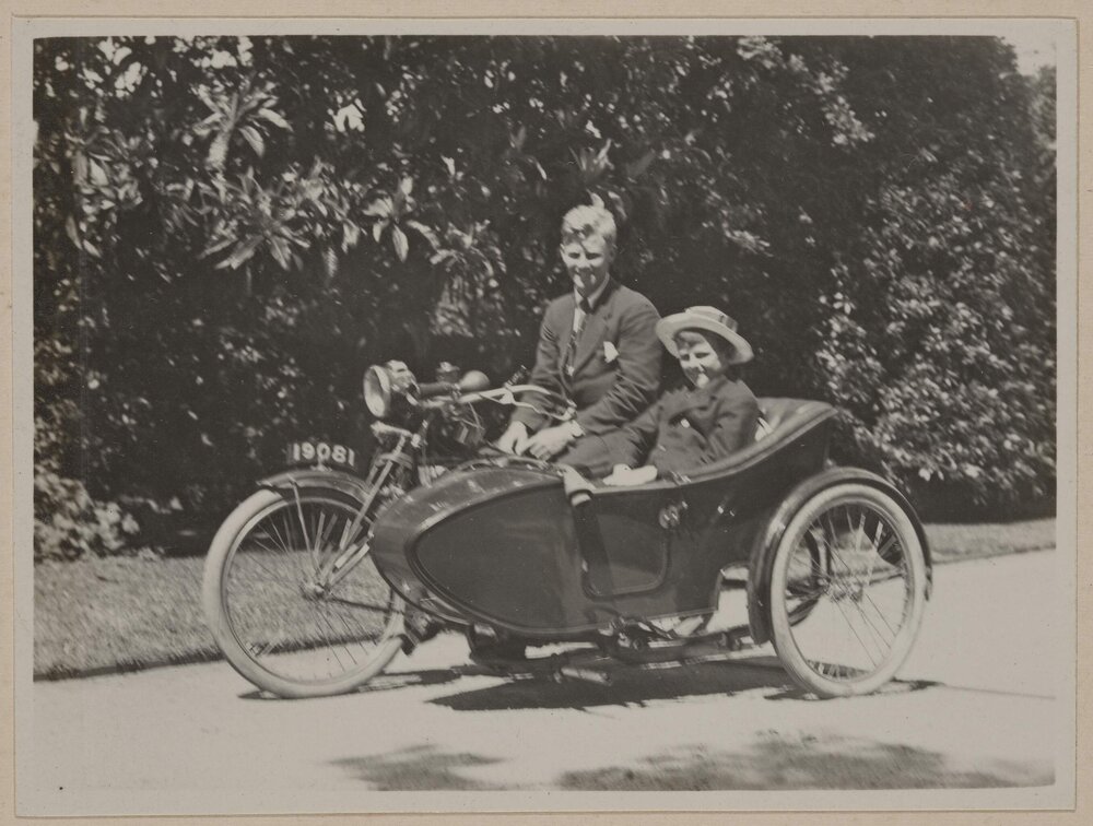 Miegunyah [two children on motor cycle with side car]