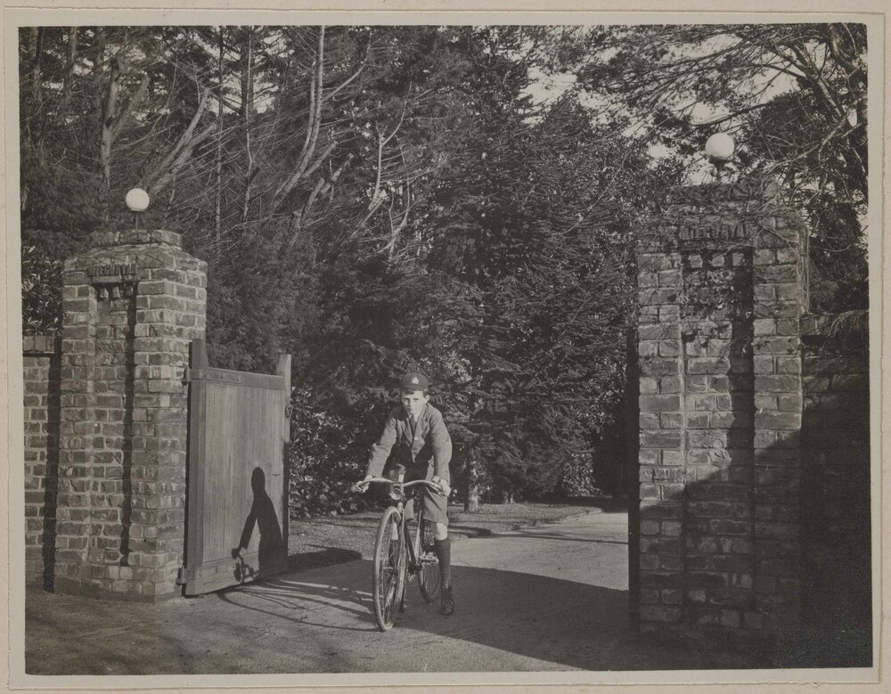 Miegunyah [young boy riding bicycle]