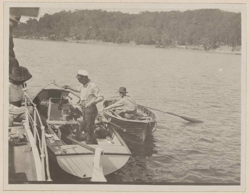 [Two small boats moored to yacht]