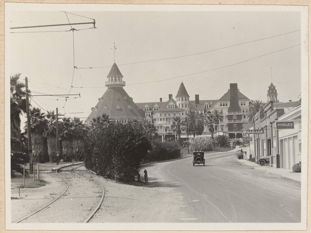 [View of motor car driving towards Coronado Beach Hotel]