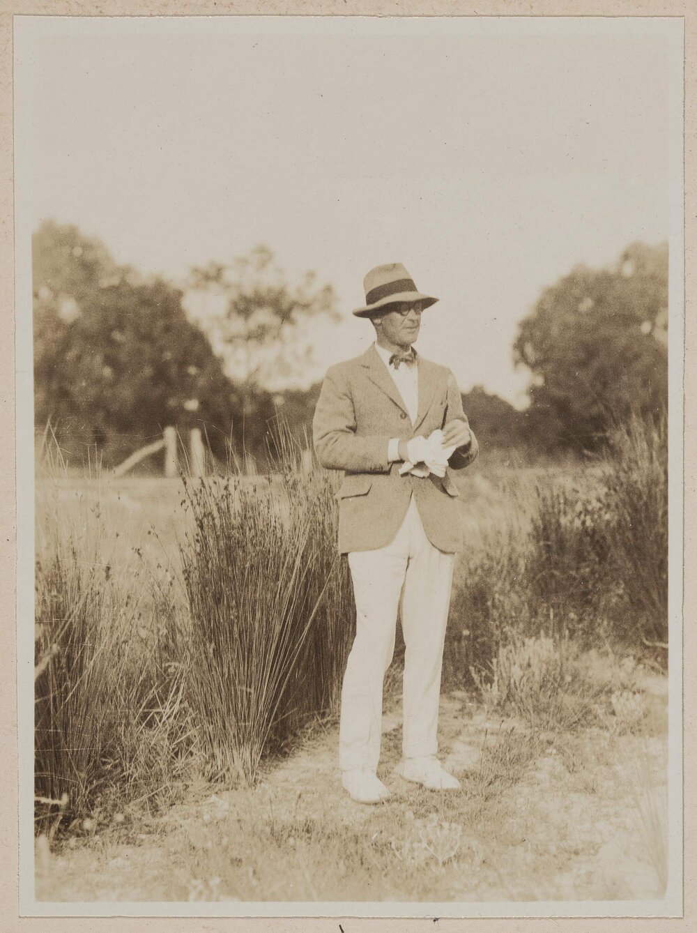[Man standing in garden at Westerfield]