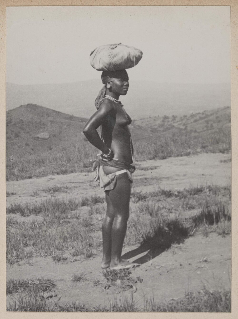 [Carrying grain, the Valley of a Thousand Hills near Durban]