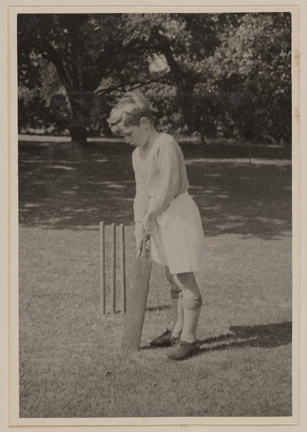 [Boy posed with cricket bat,] Miegunyah