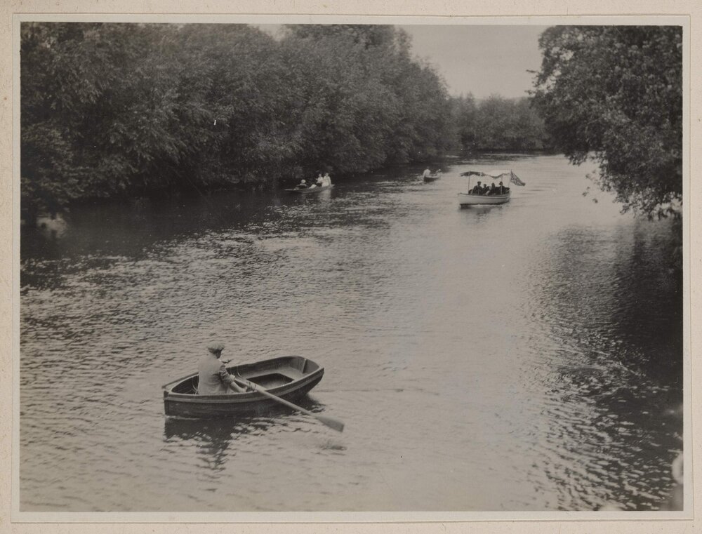 [Man in row boat]