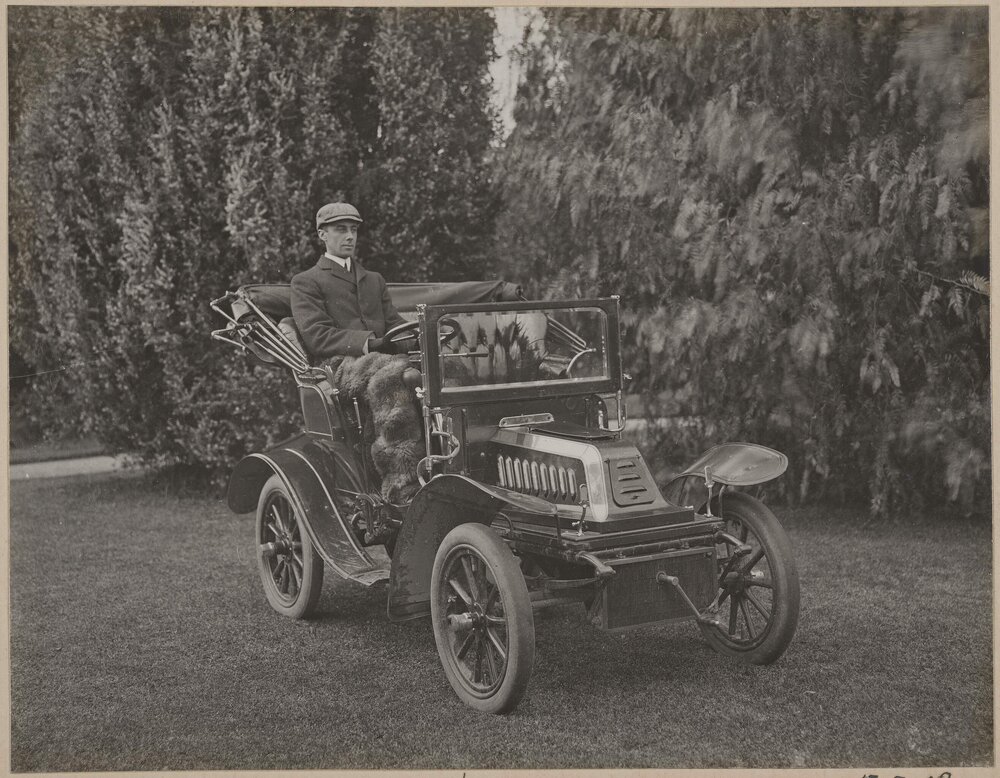 [Motor car in the grounds of] Harleston