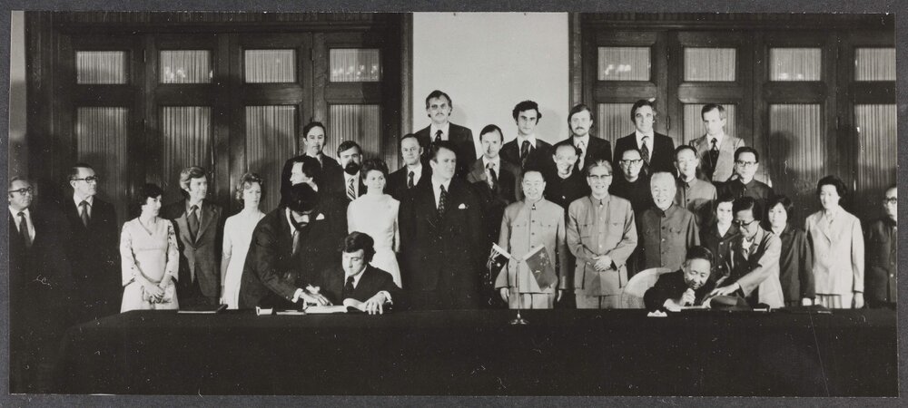 [Malcolm Fraser and others at a signing ceremony in China]